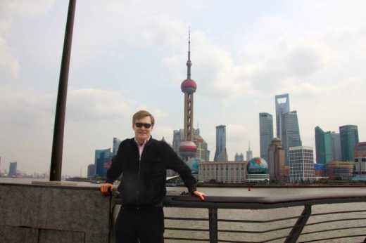 Me standing on the promenade of the Bund in Shanghai.