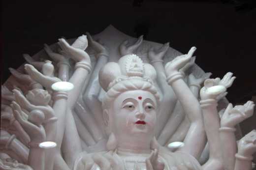 Hydra-armed Buddha at the Buddhist temple in Shanghai.