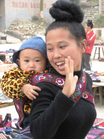 A mother and baby in Qingman Miao village 
